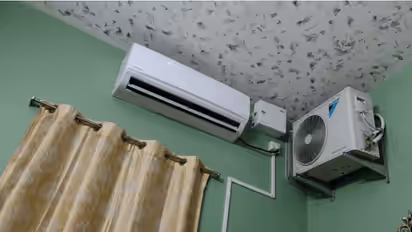 AC outdoor unit inside room