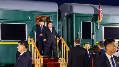 North Korea's Kim Jong Un Boards Armoured Green Train For China Visit