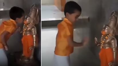 Kid kisses Hanuman