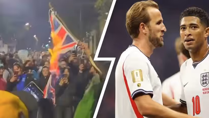 Argentina fans burn Union jack