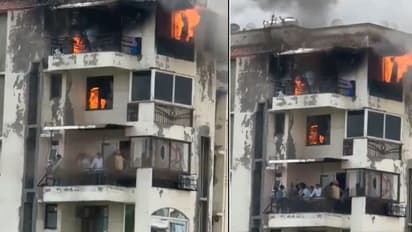 dwarka apartment fire family jump father kids dead