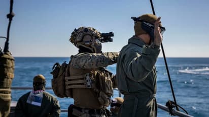 us military deployment middle east iran ground operation uss tripoli hormuz crisis houthi attacks global oil impact