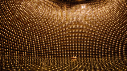 Inside the Super-Kamiokande detector in Japan, where scientists study elusive neutrinos—tiny “ghost particles” that may hold the key to understanding why matter exists in the universe