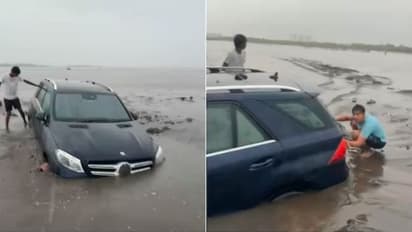Mercedes-Benz got stuck in swampy sand