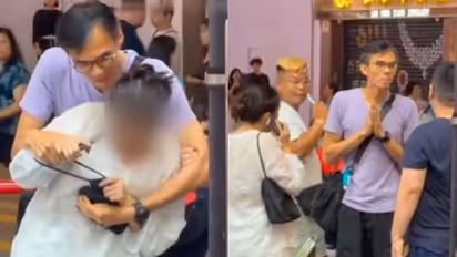 Hong Kong Man Arrested for Grabbing Woman