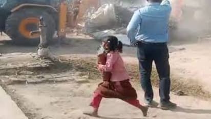 Ambedkarnagar bulldozer action little child with books