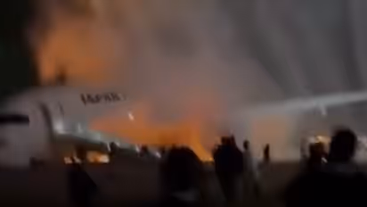 Japan Airlines Plane Bursts Into Flames After Haneda Runway Collision