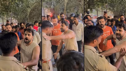 Greater Noida Clash Viral Video Man Threatens Cop Abuses During Car Dispute At Ek Murti Gol Chakkar