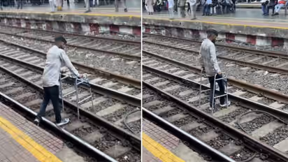 Man With Walker Crosses Railway Tracks Minutes Before Train Arrives