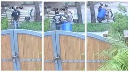 thieves stealing a waste bin