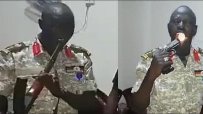 African security guard shots in his mouth with rifle and gun and catch bullets with teeth 