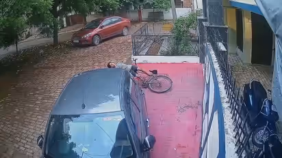 CCTV Captures Horror As Car Runs Over 13-Year-Old Cyclist And Drags Him Down Road Before Fleeing