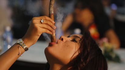 Watch women giving a tough fight to men at Cuba's famed Cigar Fest