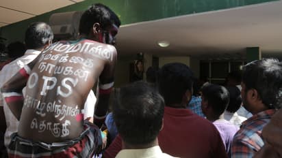 In Pics: OPS supporters camp outside his house as crisis deepens in TN