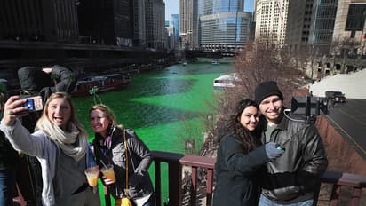 In pics: Keeping up with tradition Chicago River dyed green on St. Patrick's Day
