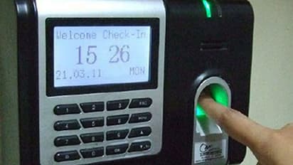 Signing a piece of paper valid or swiping your finger on the machine safer? That too in a government office