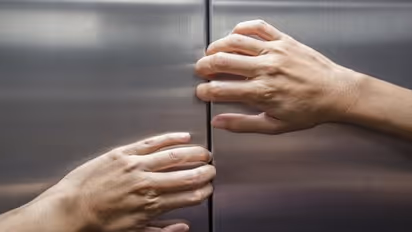 Minor gets stuck in gap between lift and duct; crushed to death