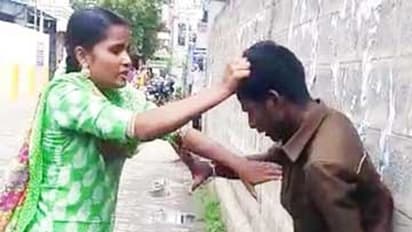 భర్త చేతిపై పచ్చబొట్టు.. ఉతికి పారేసిన భార్య