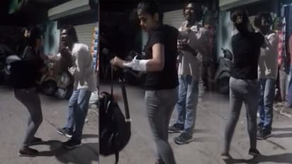 ఆకతాయిని నడిరోడ్డులో చితకబాదిన యువతి (వీడియో)