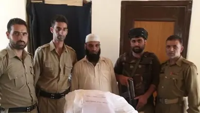 Kashmir: 'Drug dealer' imam of mosque tries to flee from police, arrested