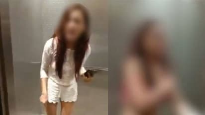 ఇప్పుడు అరెస్టు చేయండి.. డ్రెస్ విప్పేసిన యువతి