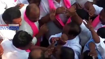 టీఆర్ఎస్ మాజీ ఎమ్మెల్యే ప్రచారాన్ని అడ్డుకున్న గ్రామస్థులు...చితకబాదిన కార్యకర్తలు