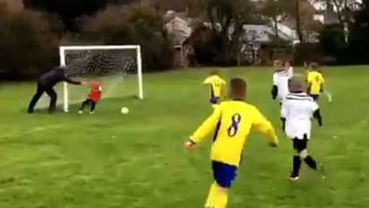 ಗೋಲ್ ತಡೆಯಲು ಮಗನನ್ನೇ ದೂಡಿದ ಅಪ್ಪ: ವಿಡಿಯೋ ವೈರಲ್