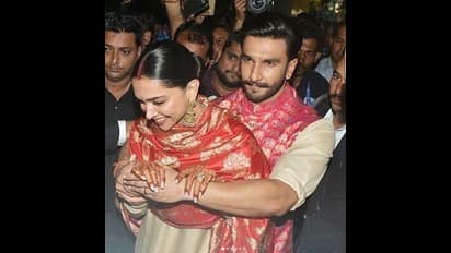 एयरपोर्ट पर फैंस की भीड़ देख रणवीर बने दीपिका के बॉडीगार्ड