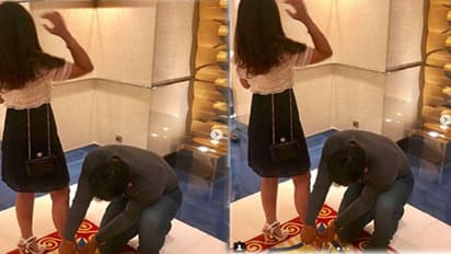 అక్కడ కెప్టెన్సీ చెల్లదు : భార్యకి చెప్పులు తొడిగిన ధోనీ