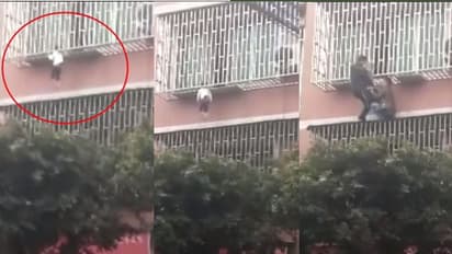 അഴികൾക്കുള്ളിൽ കഴുത്ത് കുടുങ്ങിയ നിലയിൽ തൂങ്ങിയാടുന്ന പെൺകുട്ടി; വൈറലായി വീഡിയോ