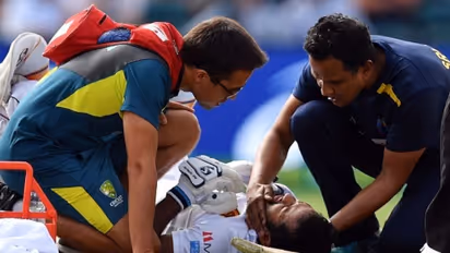 Australia vs Sri Lanka: Karunaratne hit by Cummins bouncer, stretchered off