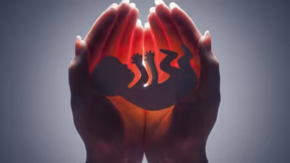 Alabama governor signs near-total abortion ban into law