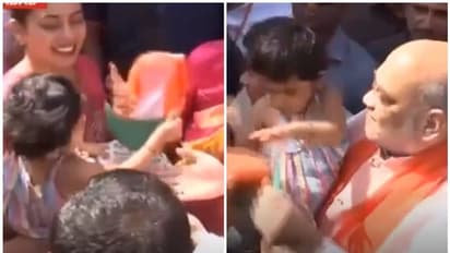 'ബിജെപി തൊപ്പി വേണ്ട, തട്ടിമാറ്റി'; അമിത് ഷായുടെ കൊച്ചു മകളുടെ കുസൃതി