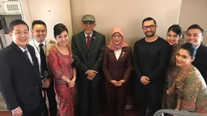 വിമാനത്തിൽ ആമിർ ഖാനെ കണ്ട് അമ്പരന്ന് സിങ്കപ്പൂർ പ്രസിഡന്റ്; ഒപ്പം നിർത്തി ഫോട്ടോയെടുത്തു