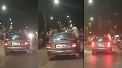 ഓടുന്ന കാറിനു മുകളിലിരുന്ന് മദ്യപാനം, യുവാക്കള്ക്ക് കിട്ടിയത് മുട്ടന്പണി!