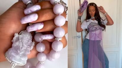 গলায় গণেশের মূর্তি ঝোলালেন রিহানা! মার্কিন পপস্টারকে নিয়ে চর্চায় নেটিজেনরা