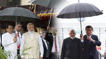 ಮೋದಿಗೆ ಮತ್ತೆ ಕೊಡೆ ಹಿಡಿದ ಗಣ್ಯರು!