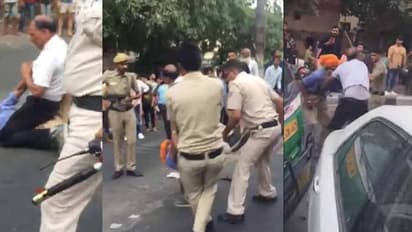 బూటు కాలితో తంతూ, రోడ్డుపై ఈడ్చుకెళుతూ: ఆటోడ్రైవర్ పట్ల పోలీసుల ‘‘అతి’’