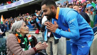 గ్రౌండ్లో కళ్లన్నీ ఆమెపైనే..కోహ్లీ సైతం కాళ్లు మొక్కాడు, ఎవరామె