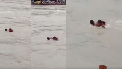 മുന്നറിയിപ്പ് മറികടന്ന് ഗംഗയില് ഇറങ്ങിയ യുവാവ് ഒഴുക്കില്പ്പെട്ടു; രക്ഷകനായി പൊലീസുകാരന് - വീഡിയോ