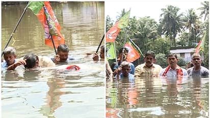 പ്രളയബാധിതർക്ക് നഷ്ടപരിഹാരം നൽകിയില്ല; പുഴയിൽ മുങ്ങി ബിജെപിയുടെ പ്രതിഷേധം