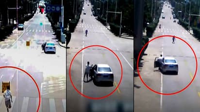 ഡ്രൈവറില്ലാതെ പാഞ്ഞ കാറിലേക്ക് 'പറന്നു കയറി' രക്ഷകനായി ടാക്സി ഡ്രൈവര്!