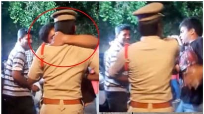ಕುಡಿದ ಮತ್ತಿನಲ್ಲಿ ಪೊಲೀಸ್ ಅಧಿಕಾರಿ ಹಿಡಿದು ಚುಂಬಿಸಿದ ಯುವಕ