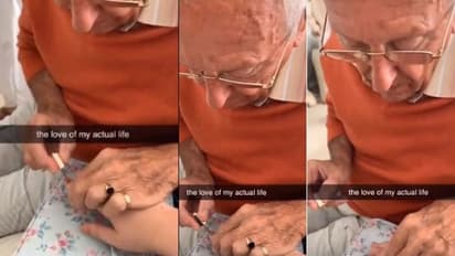 പേരക്കുട്ടിക്ക് നെയിൽ പോളിഷ് ഇട്ടുകൊടുക്കുന്ന മുത്തച്ഛൻ; ഹൃദയം നിറച്ച കാഴ്ച