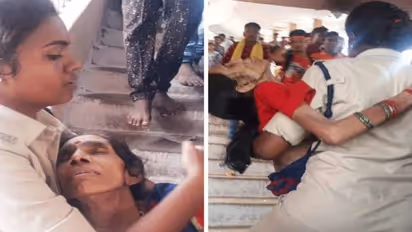 बीमार बुजुर्ग को गोद में उठाकर 100 सीढ़ियां चढ़ गई महिला सिपाही, हर कोई कर रहा तारीफ