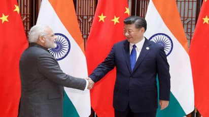 কাশ্মীরের বিশেষ মর্যাদা প্রত্যাহারের পর প্রথম দ্বিপাক্ষিক বৈঠকে মোদী - জিনপিং