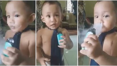 बड़ों की तरह कश लगाता दिखा बच्चा, माता-पिता की लोगों ने लगा दी क्लास