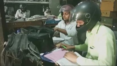 বাইক-স্কুটার নাই বা থাক, অফিসে হেলমেট পরতেই হবে, এটাই অলিখিত নিয়ম