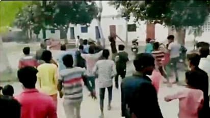 এরা নাকি ছাত্র, অশালীন আচরণে বাধা দেওয়ায় শিক্ষককেই মাটিতে ফেলে বাঁশ-পেটা করা হল, দেখুন ভিডিও