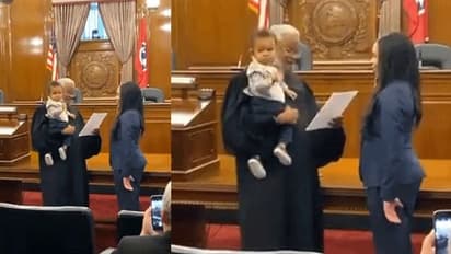 അമ്മ വക്കീലാകുന്നത് കാണാന്‍ ജഡ്ജി 'മാമന്‍റെ'  ഒക്കത്ത് കയറിയ കുഞ്ഞ് - വീഡിയോ